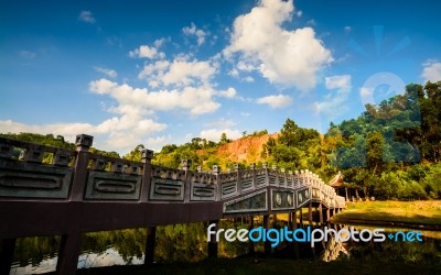 Chinese Style Bridge On The River Stock Photo