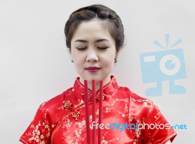 Chinese Woman With Joss Sticks Stock Photo