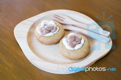 Chocolate And Marshmallow Cookie On Wooden Plate Stock Photo