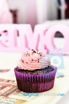 Chocolate And Strawberry Cream Cupcake Stock Photo