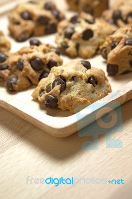 Chocolate Chip Cookies On Wood Table Stock Photo