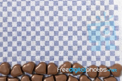 Chocolate Hearts On Fabric Stock Photo