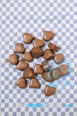 Chocolate Hearts On Fabric Stock Photo