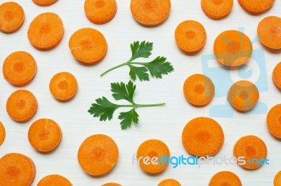 Chopped Carrot Slices With Parsley Leaves Stock Photo