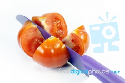 Chopping Tomatoes Stock Photo