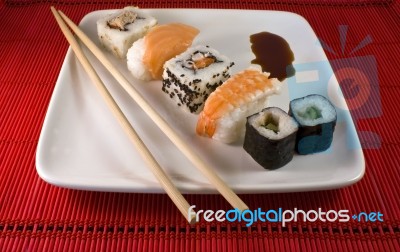 Chopsticks And Sushi Stock Photo