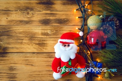 Christmas Background With Christmas Gift,red Balls, Pine Cones On Wooden Background. Christmas Vintage Style Stock Photo