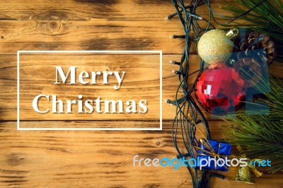 Christmas Background With Christmas Gift,red Balls, Pine Cones On Wooden Background. Christmas Vintage Style Stock Photo