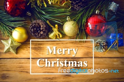 Christmas Background With Christmas Gift,red Balls, Pine Cones On Wooden Background. Christmas Vintage Style Stock Photo