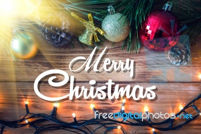 Christmas Background With Christmas Gift,red Balls, Pine Cones On Wooden Background. Christmas Vintage Style Stock Photo