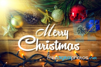 Christmas Background With Christmas Gift,red Balls, Pine Cones On Wooden Background. Christmas Vintage Style Stock Photo