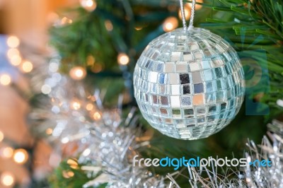 Christmas Ball With Mirrors Hanging In Tree Stock Photo