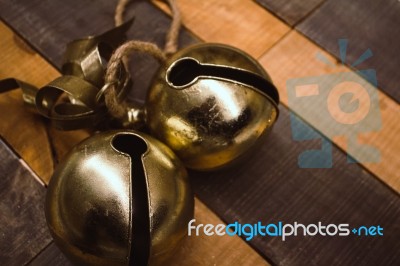 Christmas Bells On Wooden Background Stock Photo