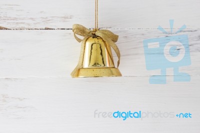 Christmas Bells On Wooden Floors Stock Photo