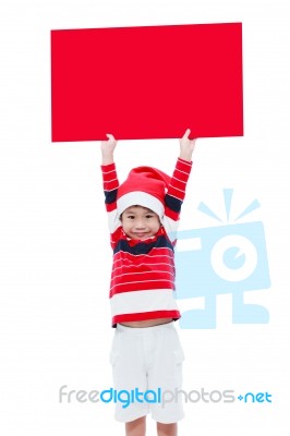 Christmas Boy With Empty Banner Stock Photo