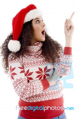 Christmas Female Pointing Upward Stock Photo