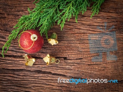 Christmas Fir Tree With Decoration On Dark Wooden Board Stock Photo