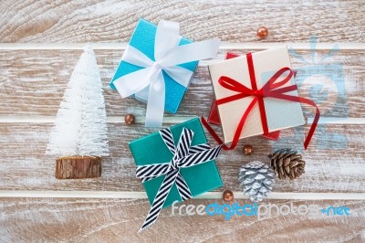 Christmas Gift Box And Xmas Tree Stock Photo