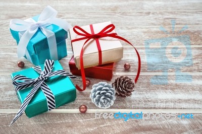 Christmas Gift Box On Wooden Table Stock Photo