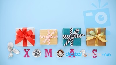 Christmas Gift Boxes With Blue Background Stock Photo