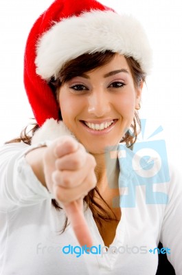 Christmas Girl Showing Thumbs Down Stock Photo