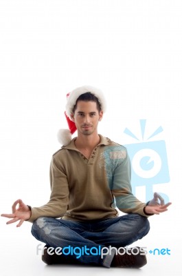 Christmas Guy Doing Meditation Stock Photo