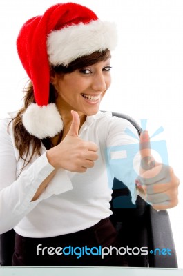 Christmas Lady Showing Thumb Up Stock Photo