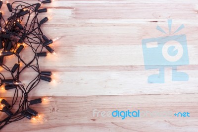 Christmas Lights,garland Lights On Wooden Background Stock Photo