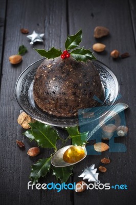 Christmas Pudding With Holly Twig Stock Photo