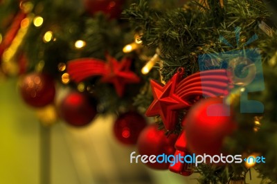 Christmas Tree Decoration With Star And Baulbs Stock Photo