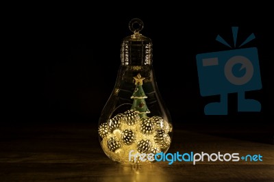 Christmas Tree With Christmas Lights In Glass Light Bulb Stock Photo