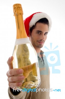 Christmas Young Guy Holding Wine Stock Photo