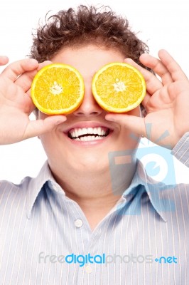 Chubby Boy And Orange Stock Photo