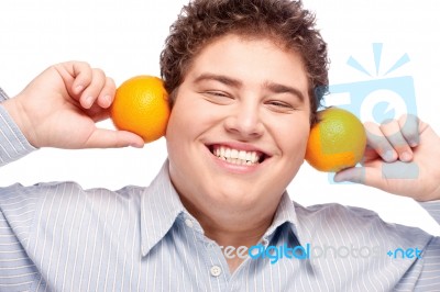 Chubby Boy And Orange Stock Photo