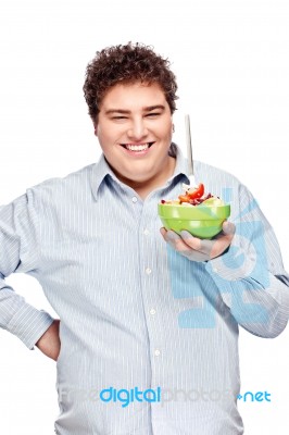 Chubby Man And Salad Stock Photo