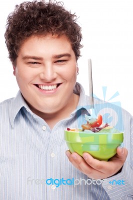 Chubby Man With Fresh Salad Stock Photo