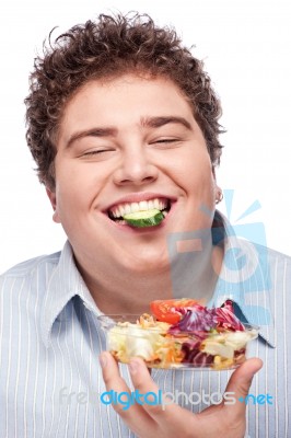 Chubby Man With Fresh Salad Stock Photo