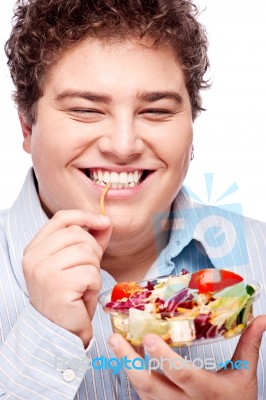 Chubby Man With Fresh Salad Stock Photo