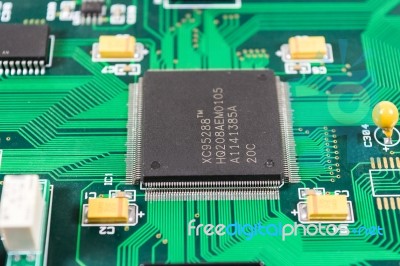 Circuit Board With Electronic Components Background Stock Photo