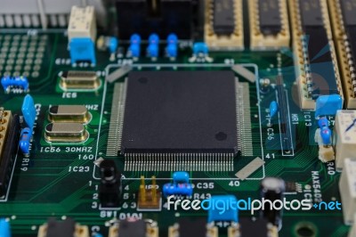 Circuit Board With Electronic Components Background Stock Photo