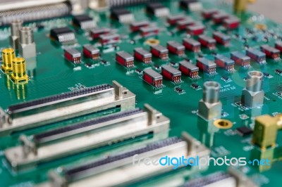 Circuit Board With Electronic Components Background Stock Photo