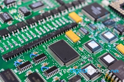 Circuit Board With Electronic Components Background Stock Photo