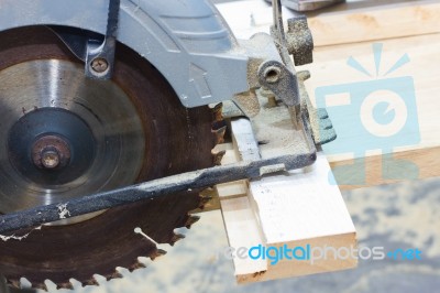 Circular Saw Cutting Wood Stock Photo