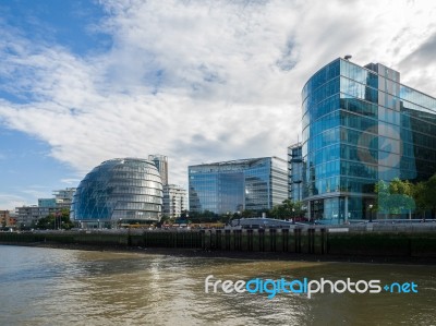 City Hall And Other Modern Buildings Along The River Thames Stock Photo