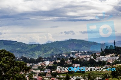 City With Mountains In The Background Stock Photo