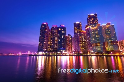 Cityscape And Gwangan Bridge In Busan, South Korea Skyline Stock Photo