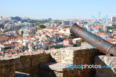 Cityscape Of Lisbon In Portugal With Cannon Weapon Stock Photo