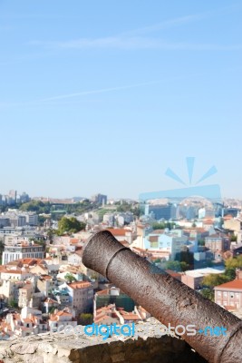 Cityscape Of Lisbon In Portugal With Cannon Weapon Stock Photo