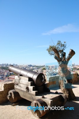 Cityscape Of Lisbon In Portugal With Cannon Weapon Stock Photo