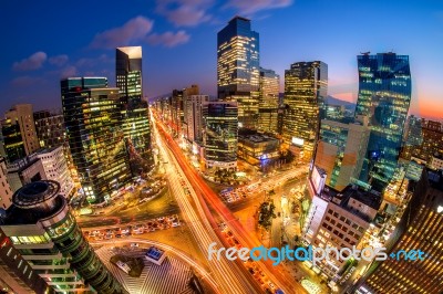 Cityscape Of South Korea. Night Traffic Speeds Through An Intersection In The Gangnam District Of Seoul,south Korea Stock Photo